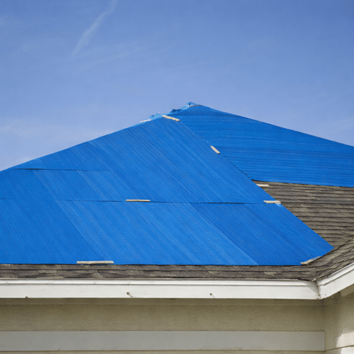 Storm damage roof tarping